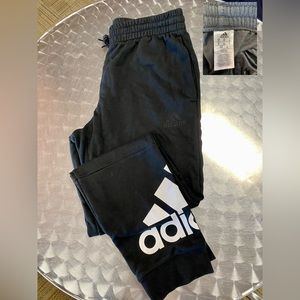 Men’s Adidas sweatpants. Used but still has lots of life left.